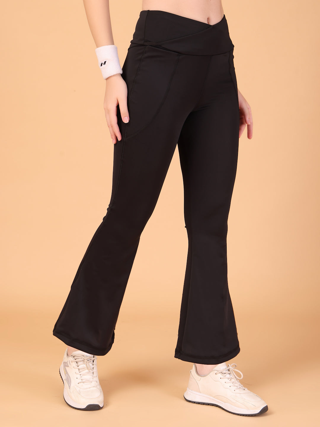 CUKOO Black High Waist Flared Workout Leggings for women with Side Pockets – Stretch & Breathable Athleisure Pants